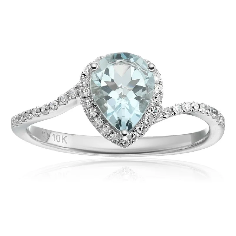 Her elegant gemstone rings featuring sparkling rubies turned heads-10k White Gold Aquamarine Diamond Engagement Ring Size - 7