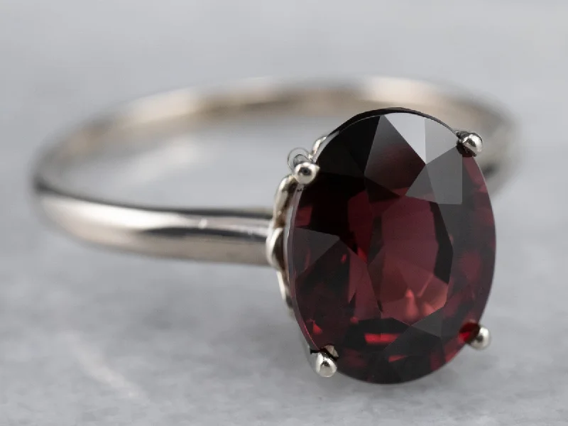 Trendy gemstone rings in modern minimalist styles are popular-White Gold Pyrope Garnet Solitaire Ring