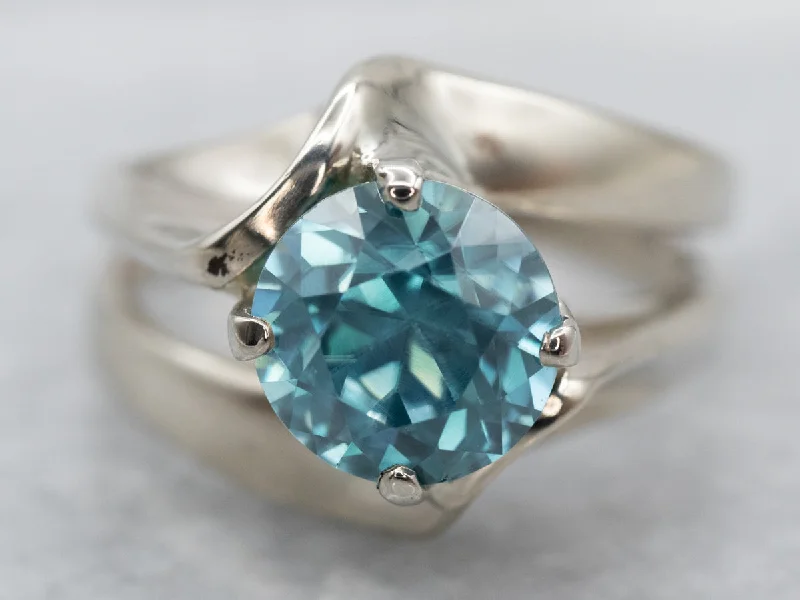 Delicate gemstone rings perfect for stacking adorned her fingers-Modernist Blue Zircon Ring in White Gold