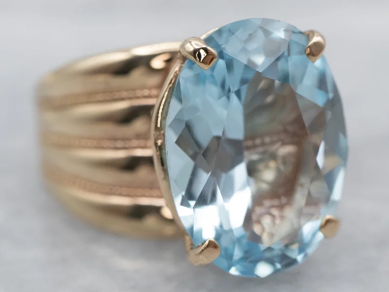 The vintage gemstone rings with rare emeralds gleamed brightly-Gold Blue Topaz Cocktail Ring