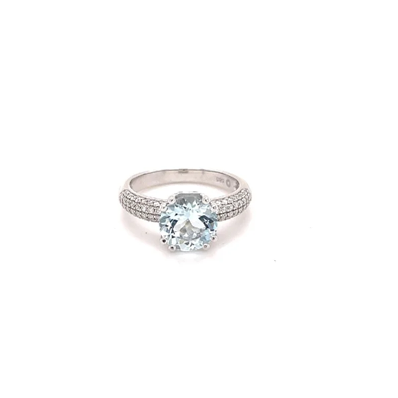 Her elegant gemstone rings featuring sparkling rubies turned heads-14Kt White Gold Aquamarine and Diamond Ring