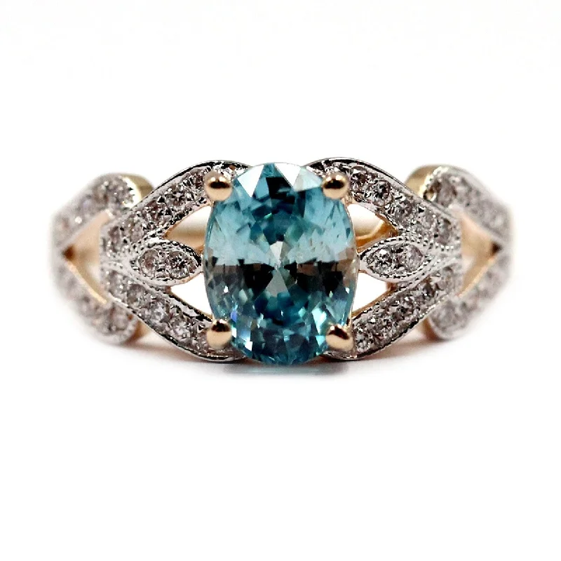 Delicate gemstone rings perfect for stacking adorned her fingers-14Kt Yellow Gold Blue Zircon and Diamond Ring