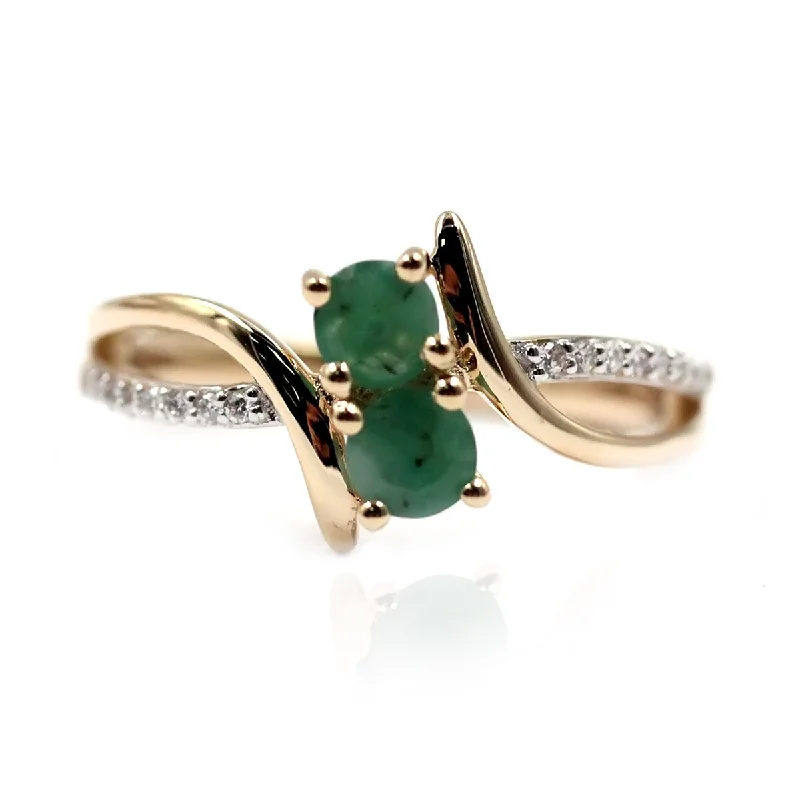 Her elegant gemstone rings featuring sparkling rubies turned heads-14Kt Yellow Gold Emerald and Diamond Ring