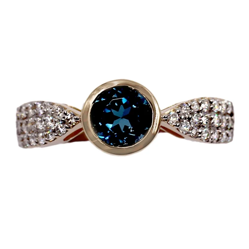 Affordable gemstone rings under fifty dollars surprised her greatly-14KT Yellow Gold London Blue Topaz and Diamond Ring