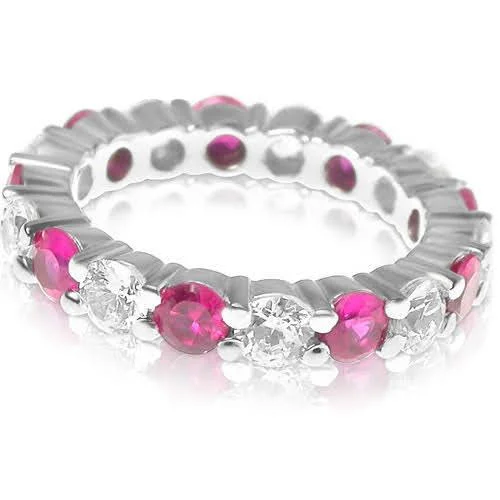 Trendy gemstone rings in modern minimalist styles are popular-4.10 CT Round Cut Rubies & Diamonds - Eternity Ring