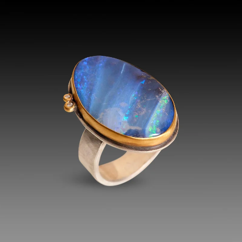 The vintage gemstone rings with rare emeralds gleamed brightly-Boulder Opal Ring