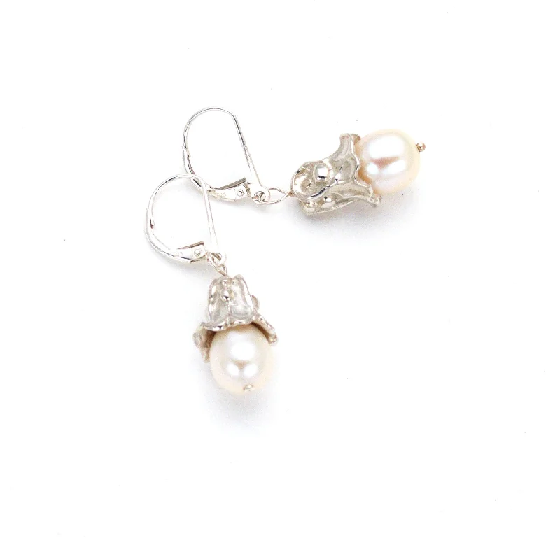 Drop earrings with pastel-colored stones for a soft and feminine look -Cantabury Bell