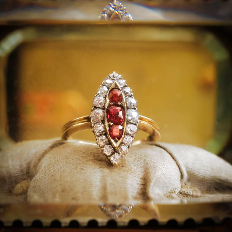 Colorful gemstone rings with vibrant opals shimmered in light-Nicely Nostalgic Antique Navette Ruby and Diamond Ring