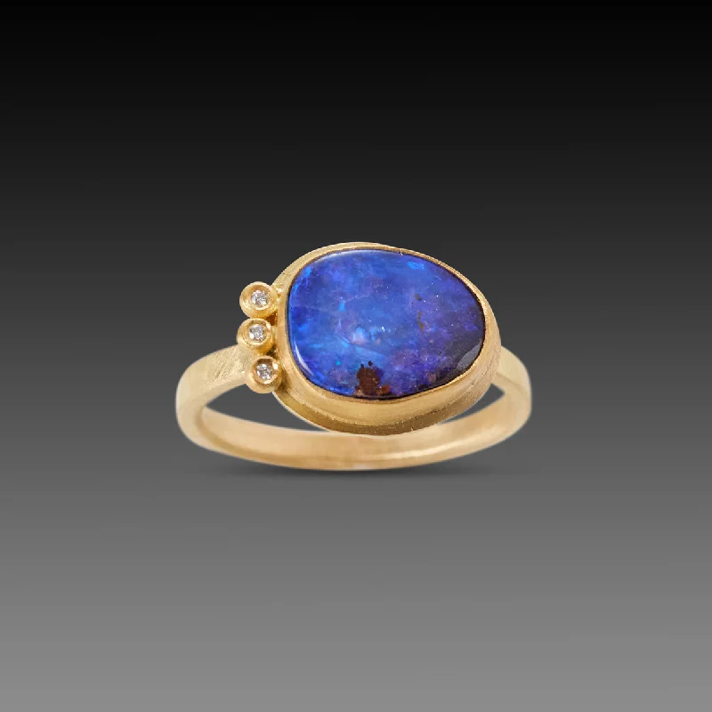 Restored antique gemstone rings regained their original stunning beauty-Organic Australian Boulder Opal Ring with Three Diamonds