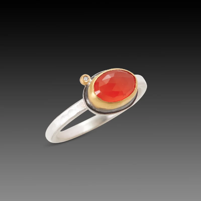 Her elegant gemstone rings featuring sparkling rubies turned heads-Oval Carnelian Ring