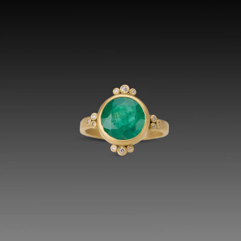 He found affordable gemstone rings for everyday wear online-Round Emerald Ring With Diamond Trios