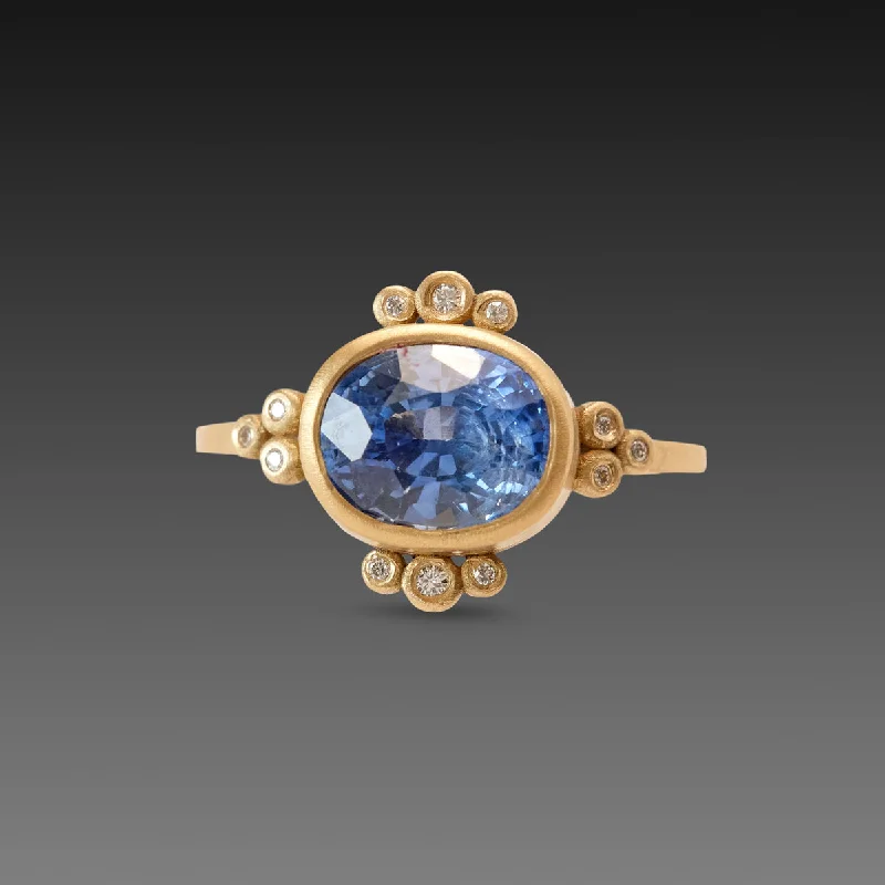 Heirloom gemstone rings passed down through generations held memories-Oval Sapphire Ring with Diamond Trios