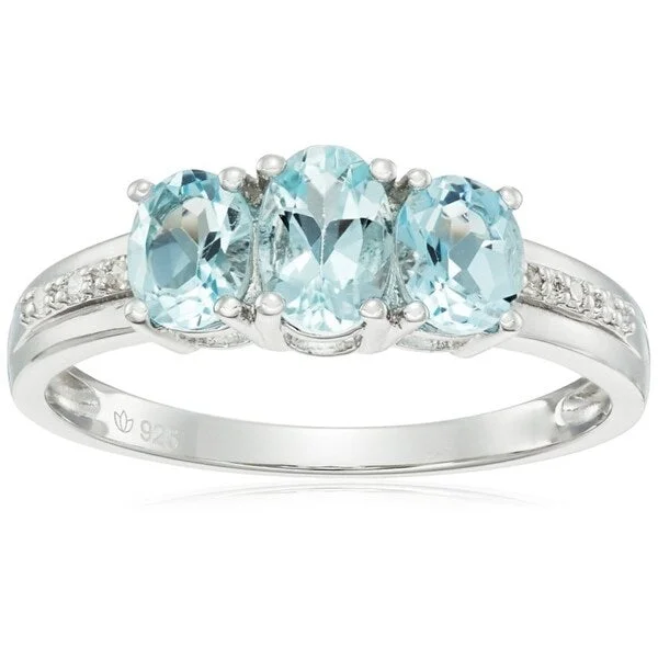 He found affordable gemstone rings for everyday wear online-Sterling Silver Aquamarine, Diamond Accent 3-Stone Oval Ring, Size 7 - Blue