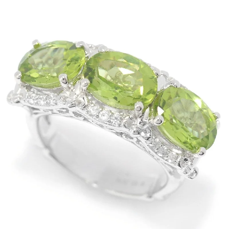 Designer gemstone rings showcased at jewelry expos impressed all-Sterling Silver Oval Peridot & White Zircon East-West Ring