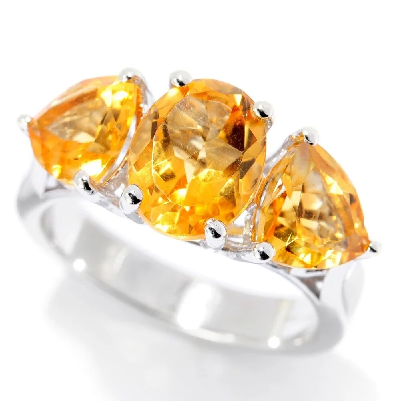 They ordered custom gemstone rings designed for special occasions-Sterling Silver Oval & Trillion Citrine Ring