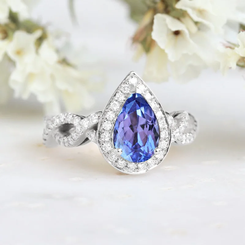 Classic gemstone rings in timeless gold bands never fade-Tanzanite pear shape 1.0-1.20 carat & Diamonds Twist band