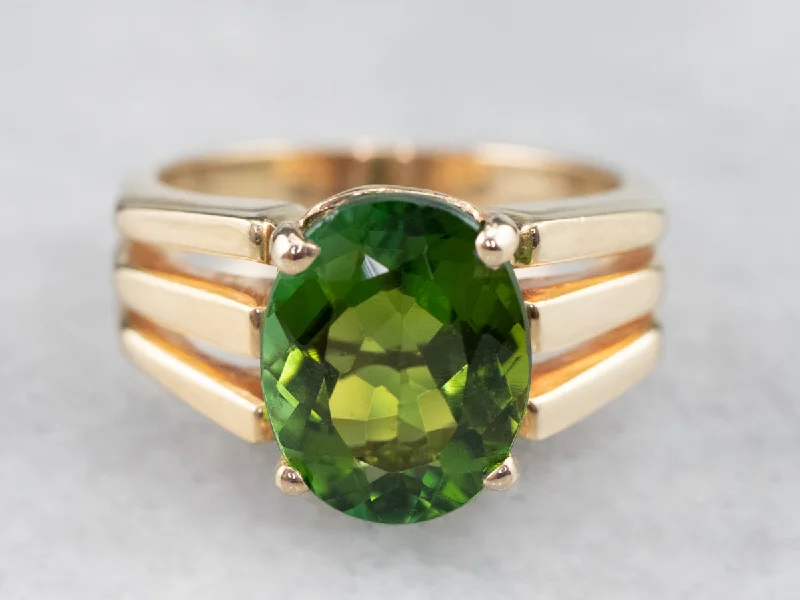 Ethical gemstone rings sourced from sustainable mines gained traction-Vintage Green Tourmaline and Gold Ring